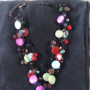 6 strand beaded necklace.